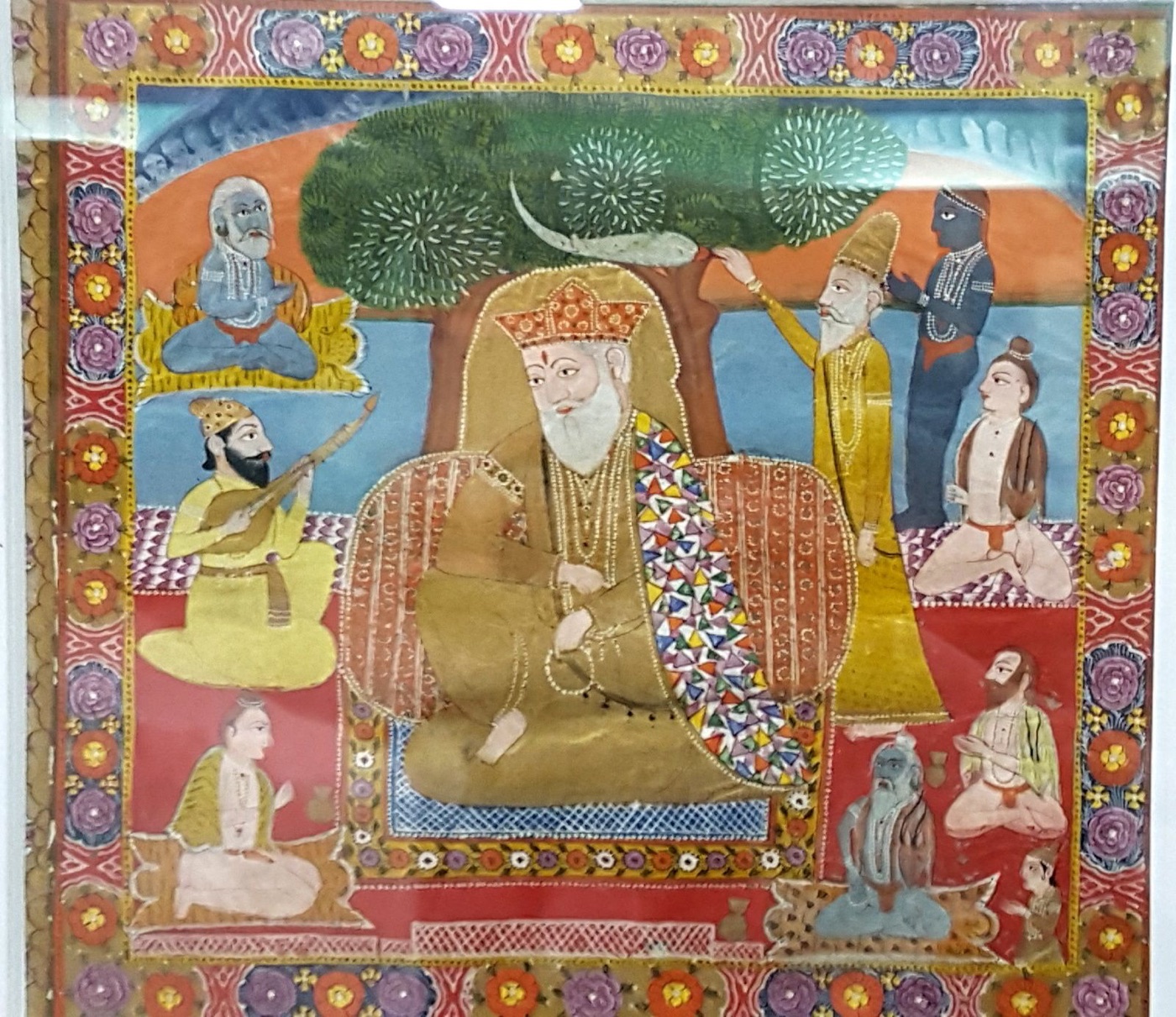 Early nineteenth-century painting of Guru Nanak seated with followers